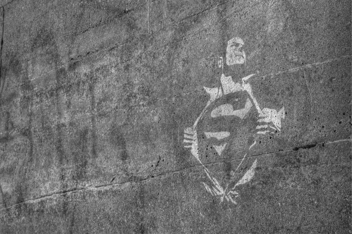 A picture of a superman graffiti